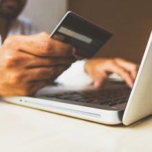 Stock photo of the Business Man with a credit card by rupixen